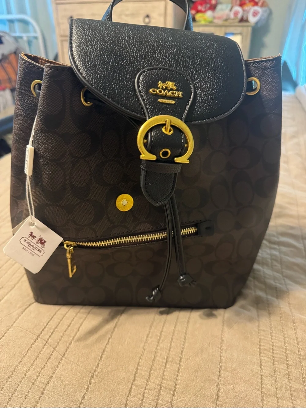 Coach Brown Signature Drawstring Backpack with Black Trim and Gold Hardware
